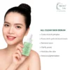 Nature’s Law All Clear Skin Serum bottle held by a smiling woman, promoting acne and dark spot treatment.